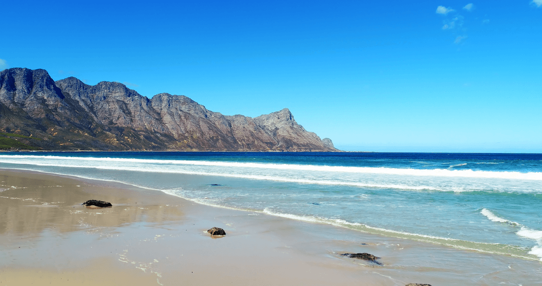 Transparent Waves Crashing on Peaceful Scenic Beach