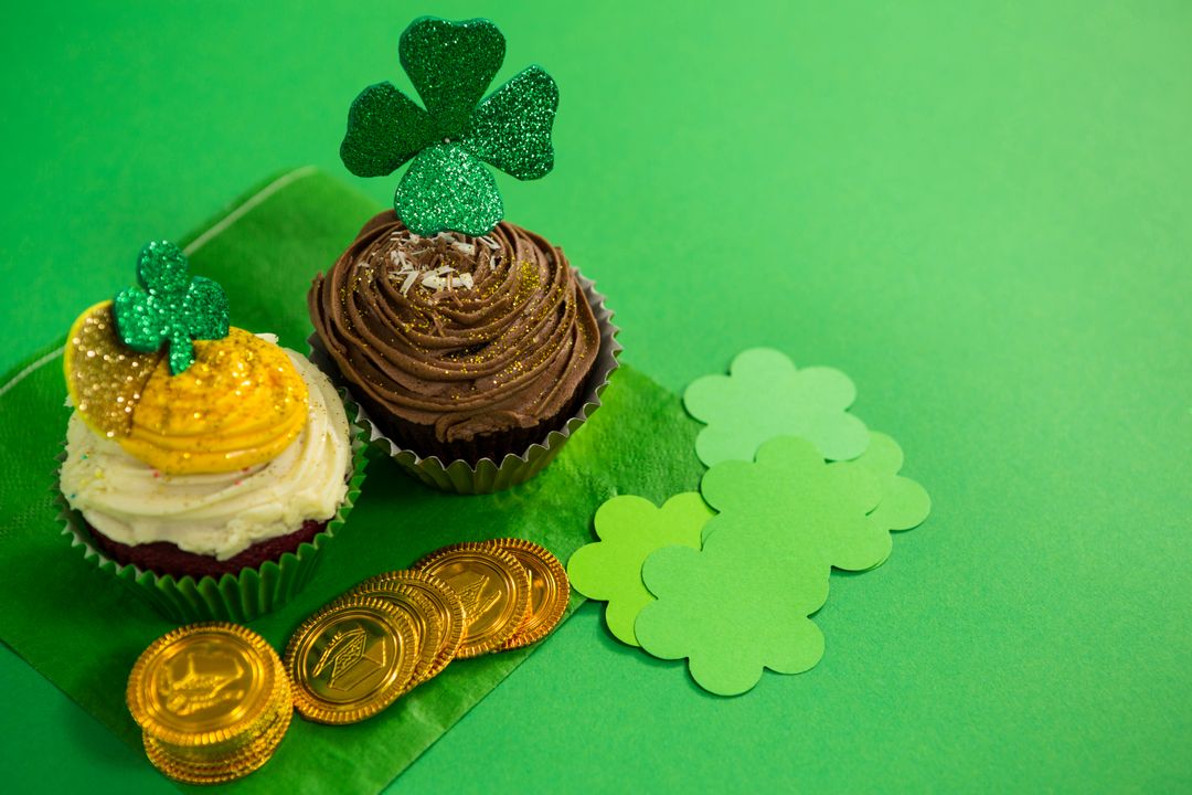 St. Patrick's Day Cupcakes with Shamrock Toppers and Gold Coins - Free Images, Stock Photos and Pictures on Pikwizard.com