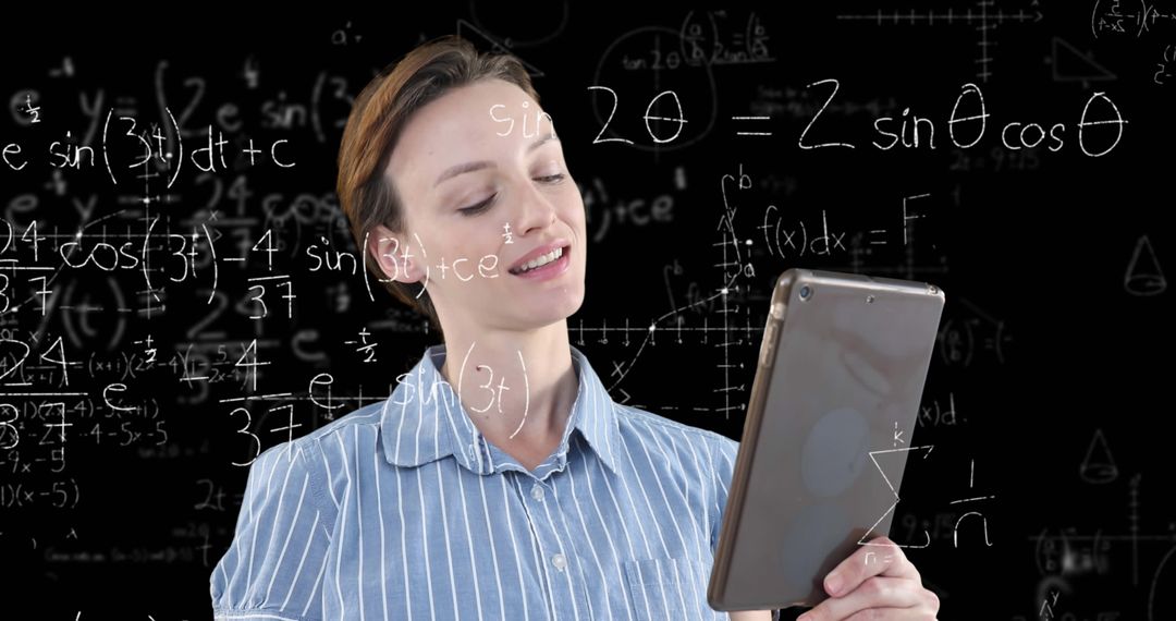 Image of a Caucasian woman using her tablet with floating mathematics formulae on black background - Free Images, Stock Photos and Pictures on Pikwizard.com