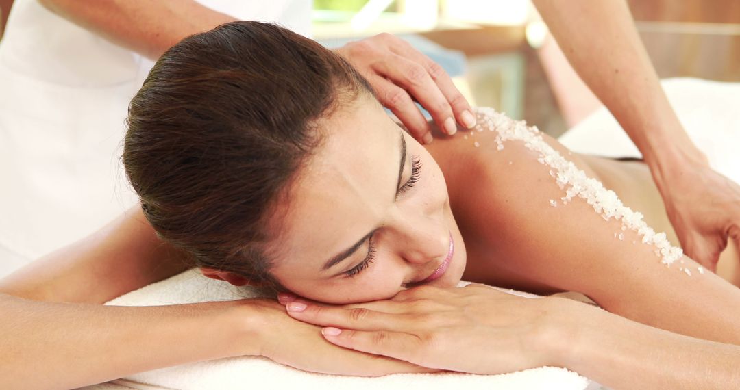 Woman Relaxing During Salt Scrub Spa Treatment - Free Images, Stock Photos and Pictures on Pikwizard.com