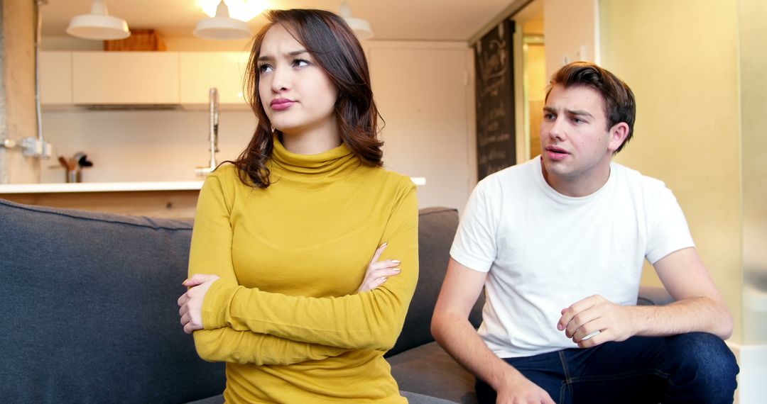 Couple Arguing in Modern Living Space - Free Images, Stock Photos and Pictures on Pikwizard.com