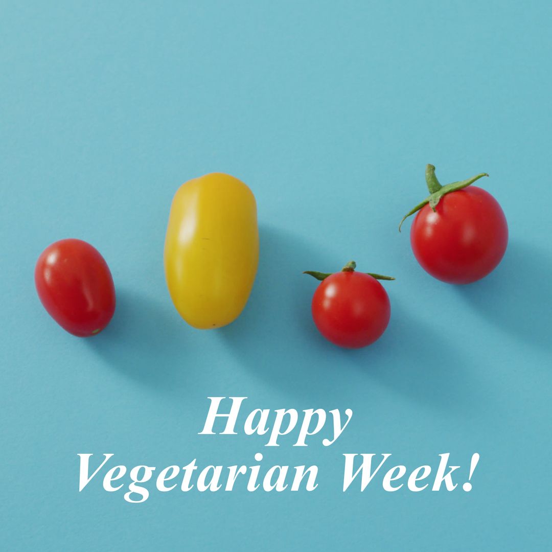 Vegetarian Week Celebration with Colorful Tomatoes on Blue Background - Download Free Stock Templates Pikwizard.com