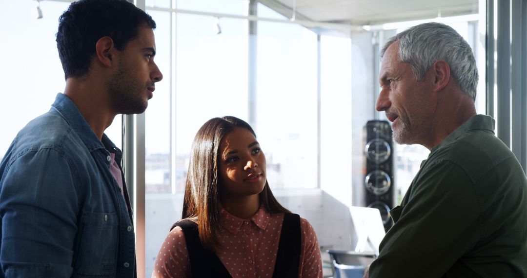 Diverse Professionals Engaging in Multigenerational Discussion