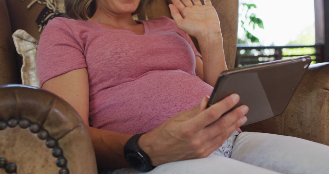 Pregnant Woman Having Video Call Happily Relaxed at Home