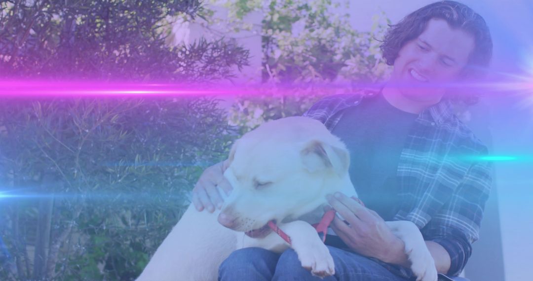 Lens Flare Portayal of Man Embracing Dog in Tranquil Garden Oasis