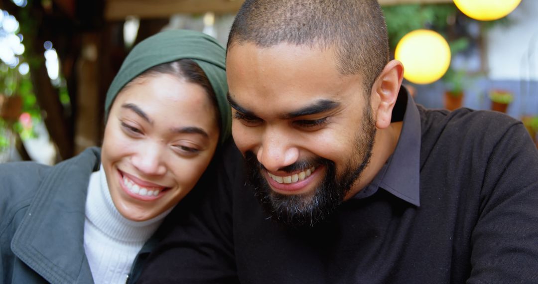 Happy Couple Enjoying Time at Cafeteria Together