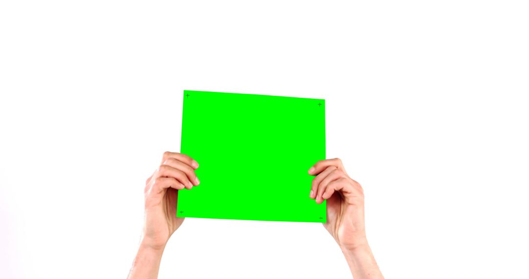 Hands Holding Green Board on White Background - Free Images, Stock Photos and Pictures on Pikwizard.com