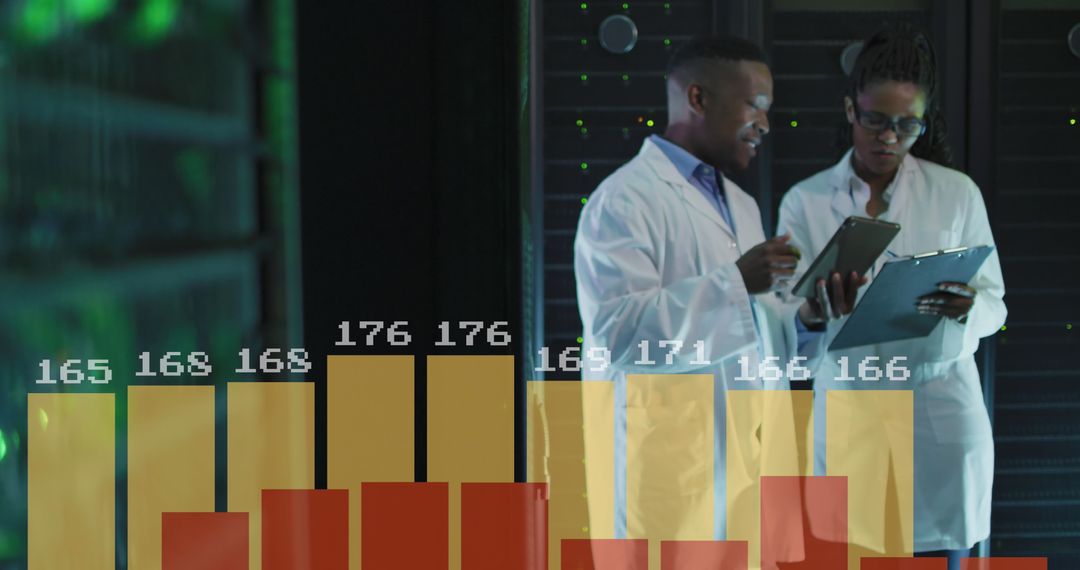 Diverse IT Engineers Analyzing Data on Digital Tablets in Server Room