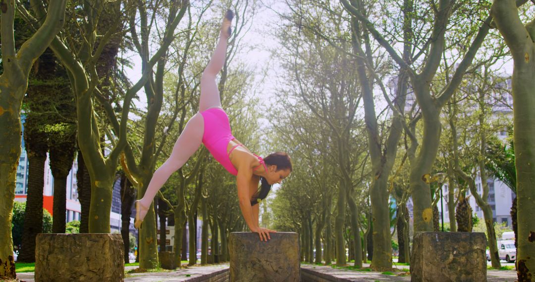 Woman Performing Ballet on Urban Pathway - Free Images, Stock Photos and Pictures on Pikwizard.com