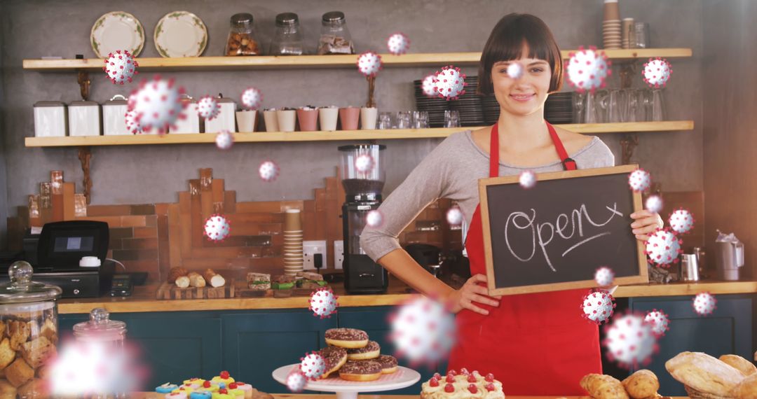 Confident Bakery Worker Holding Open Sign Amidst Virus Illustrations