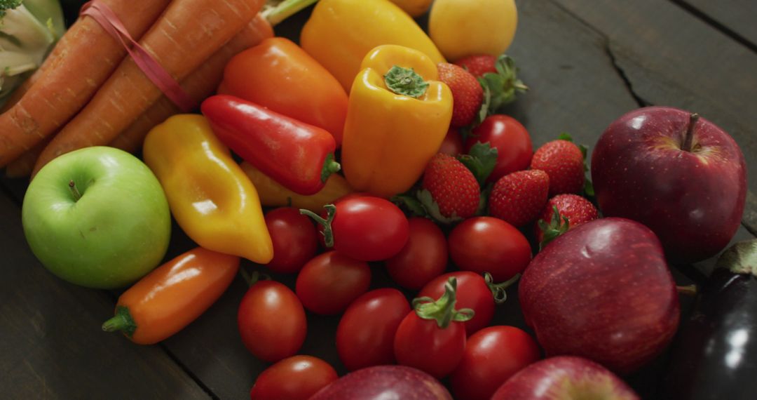 Fresh Colorful Fruits and Vegetables Arrangement on Dark Surface