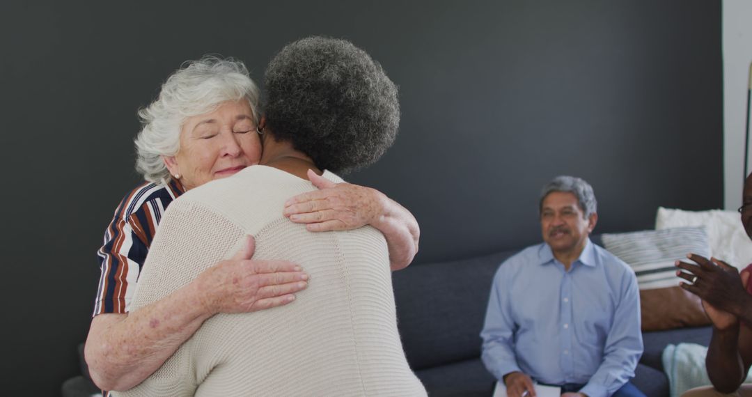 Diverse Group of Seniors Embracing and Enjoying Time Together - Free Images, Stock Photos and Pictures on Pikwizard.com