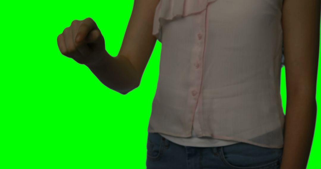 Woman Imitating a Touchscreen Gesture on Green Screen - Free Images, Stock Photos and Pictures on Pikwizard.com