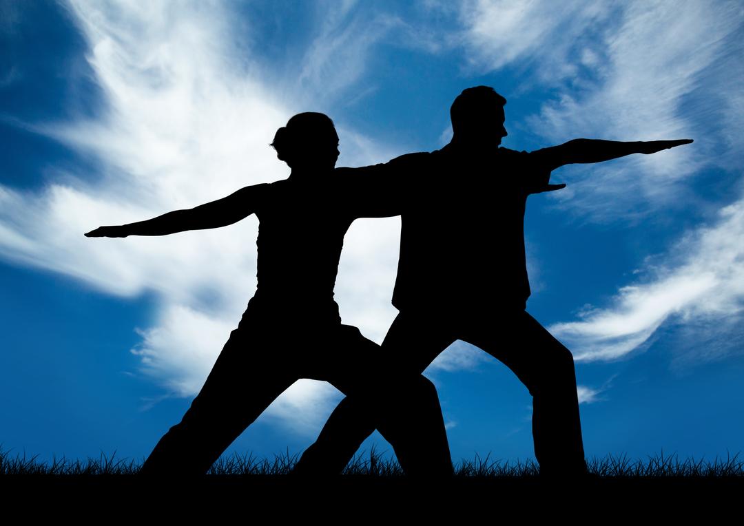 Silhouette of couple exercising against sky in background - Free Images, Stock Photos and Pictures on Pikwizard.com