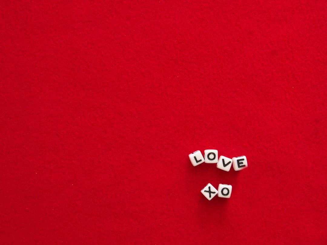 Love Message Dice on Red Background