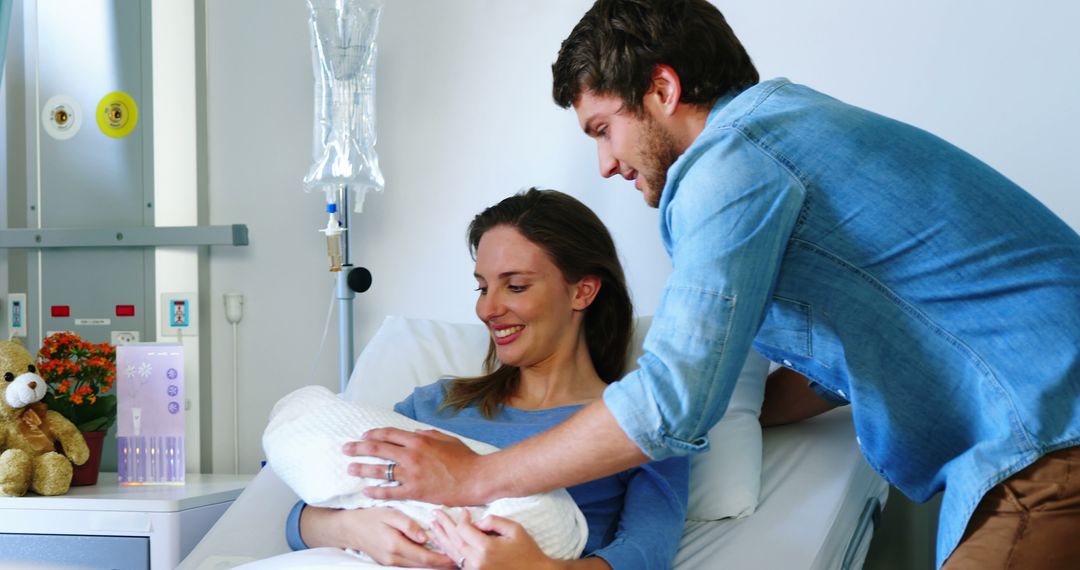 Joyful Parents Meeting Newborn Baby in Hospital Room - Free Images, Stock Photos and Pictures on Pikwizard.com