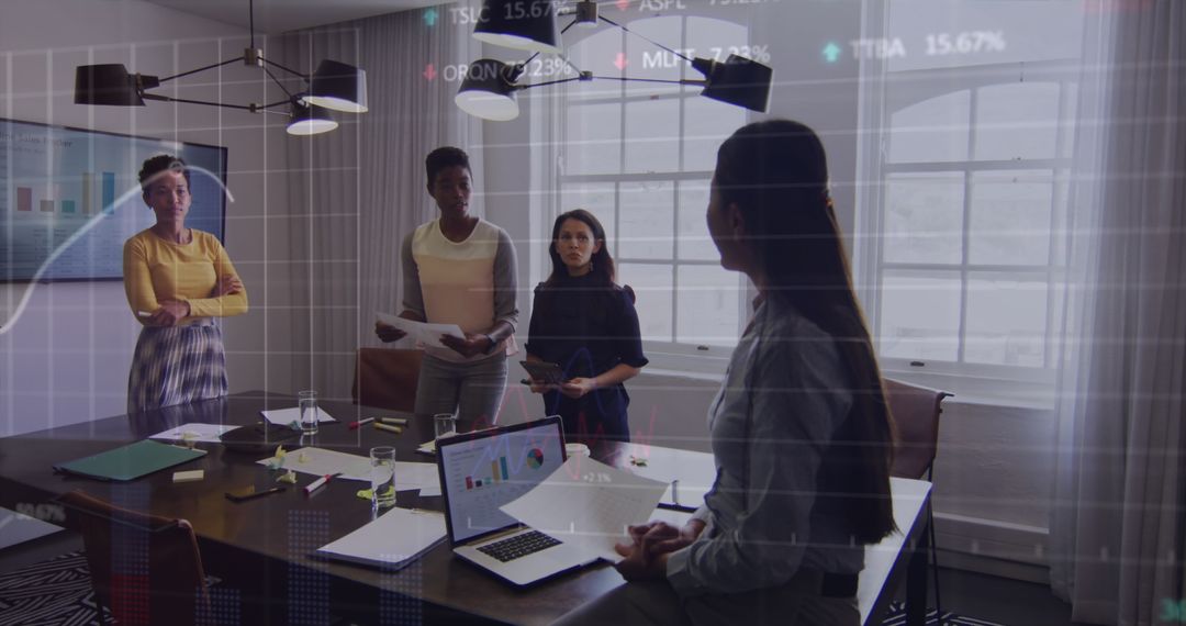 Diverse Business Team Collaborating with Finance Data in Meeting