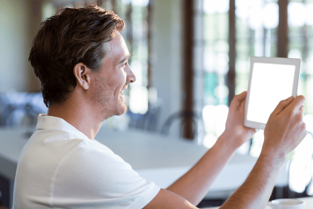 Transparent Tablet Screen Mockup with Person in Cafe