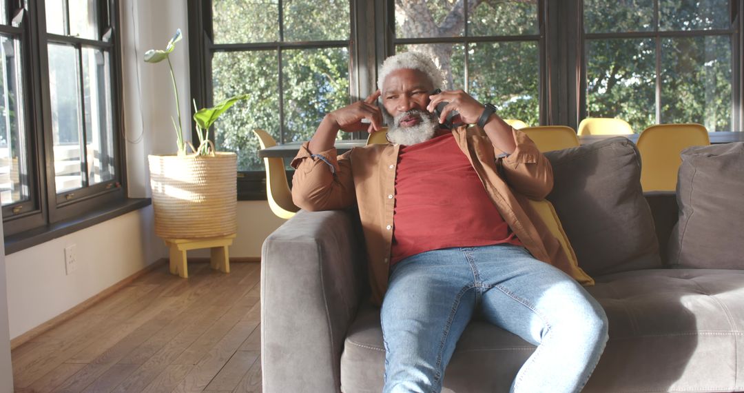Senior Man Engaged in Personal Reflection at Home