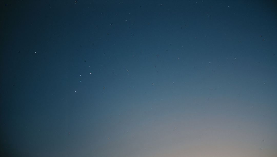 Tranquil Evening Sky with Stars at Dusk