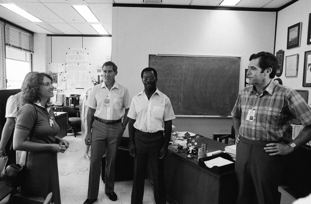 NASA Team Collaborating in Office for STS-51L Mission Preparation 1985 - Free Images, Stock Photos and Pictures on Pikwizard.com