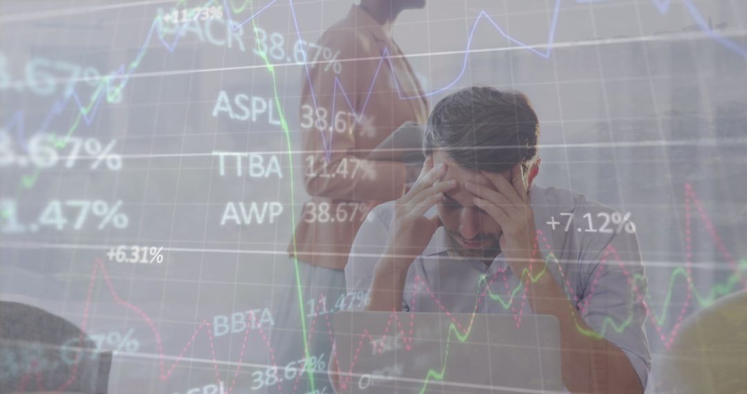 Stressed Businessman Analyzing Stock Market Data at Workplace