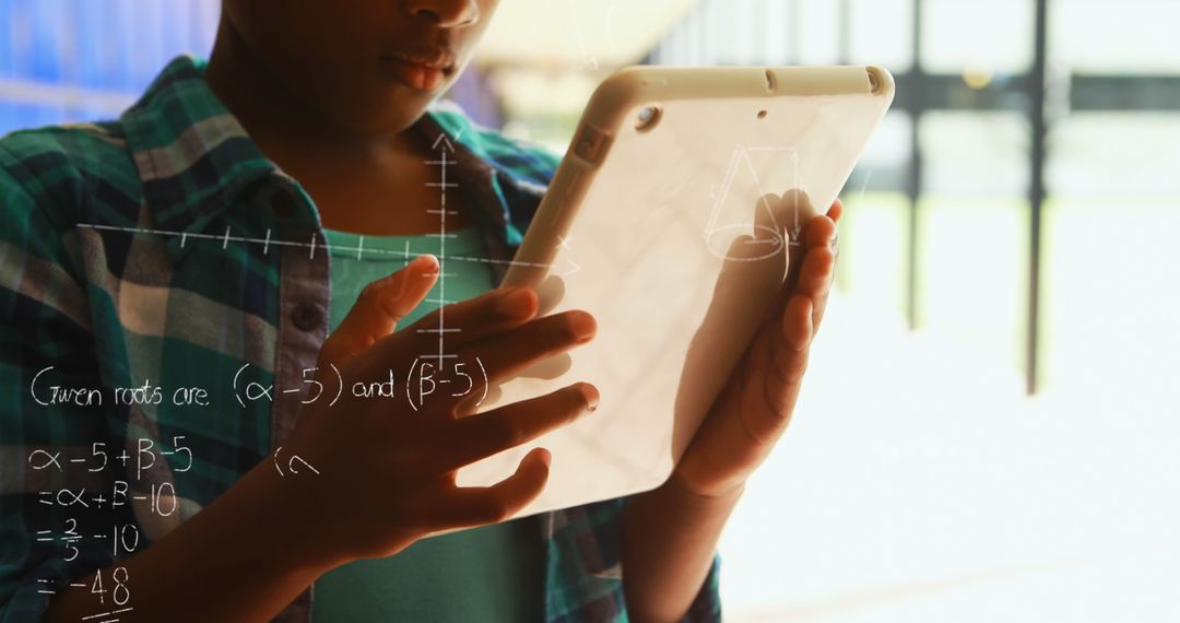 Schoolchild Engaging in Math Learning on Digital Tablet