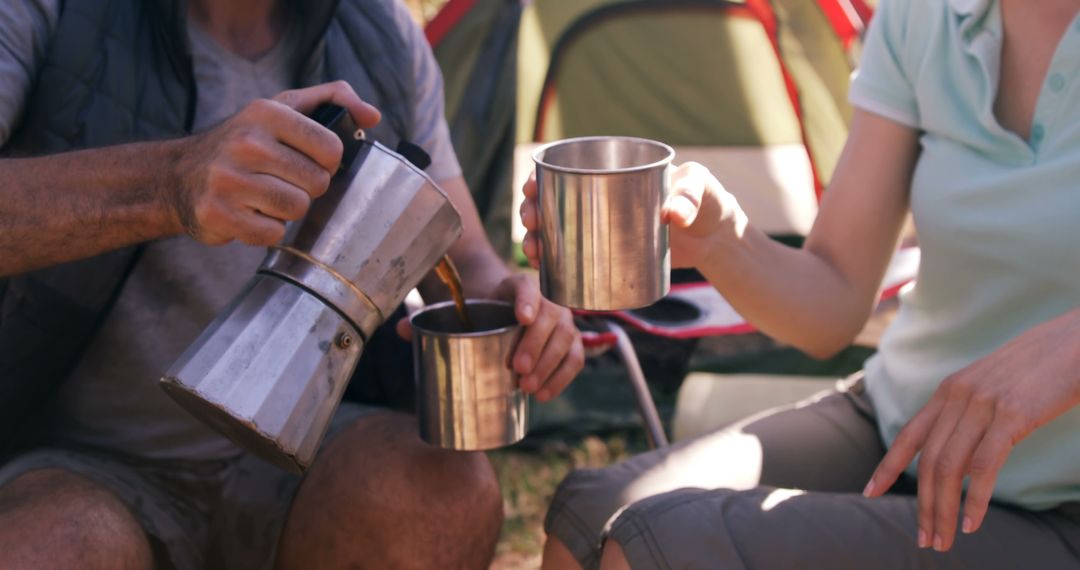 Friends Enjoying Coffee at Campsite in Morning - Free Images, Stock Photos and Pictures on Pikwizard.com