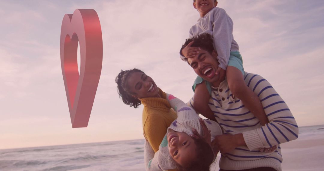Joyful Family Day at Beach with Floating Heart Symbol