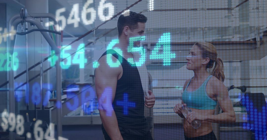 Trainer and Client Pausing Workout in Tech-Driven Gym with Digital Data Overlay