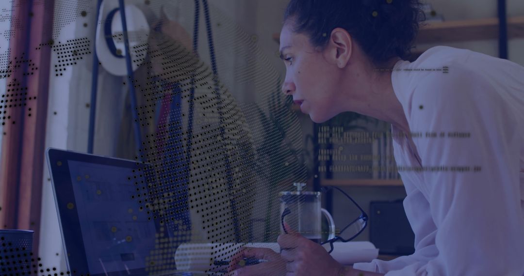 Focused Woman Coding on Laptop at Digital Workspace