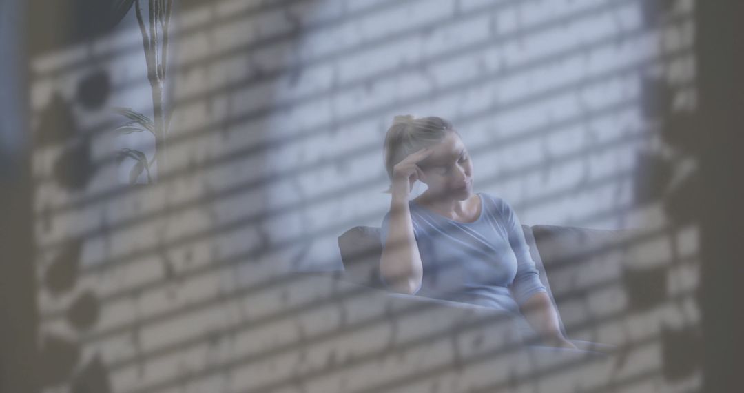 Reflective Woman in Contemplative Mood in Cozy Home