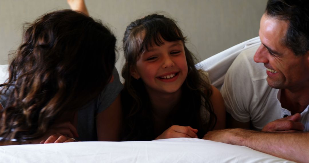 Joyful Family Moment with Child Relaxing at Home