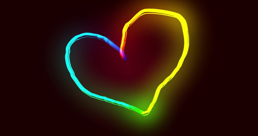 Glowing Rainbow Heart Shape on Black Background