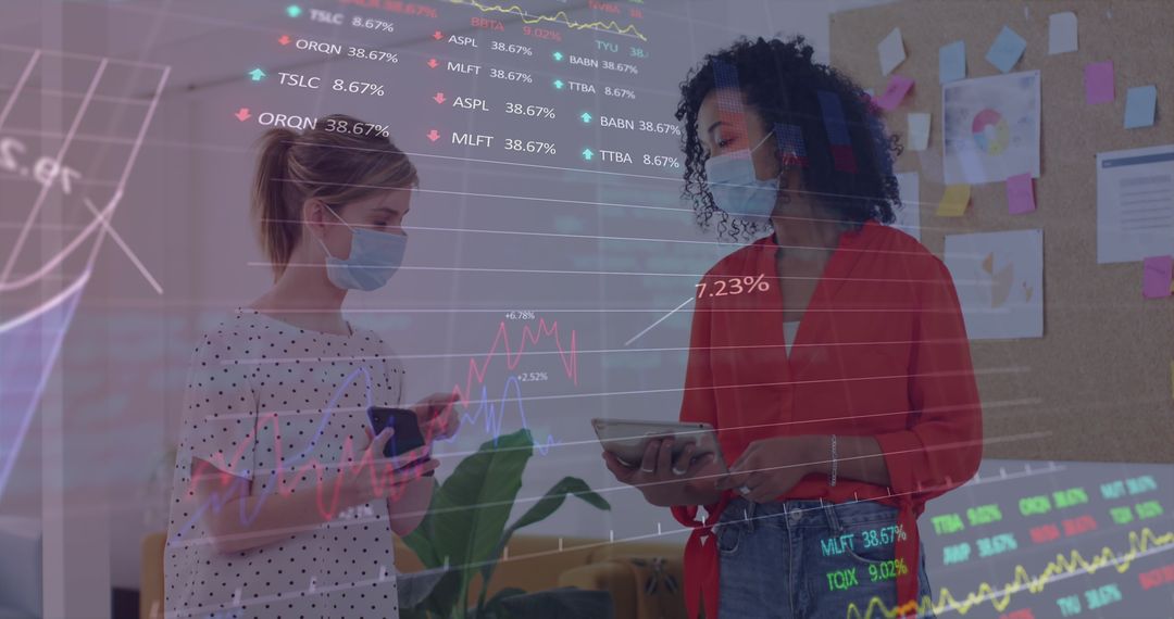 Colleagues Discussing Analytics in Office During Pandemic