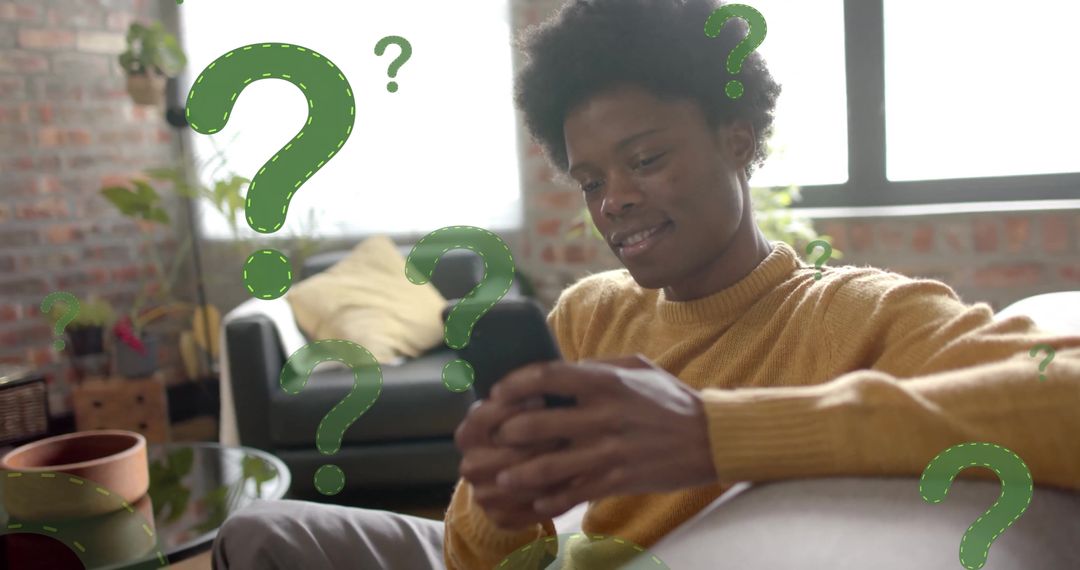 Curious Businessman Relaxing with Smartphone Surrounded by Question Marks
