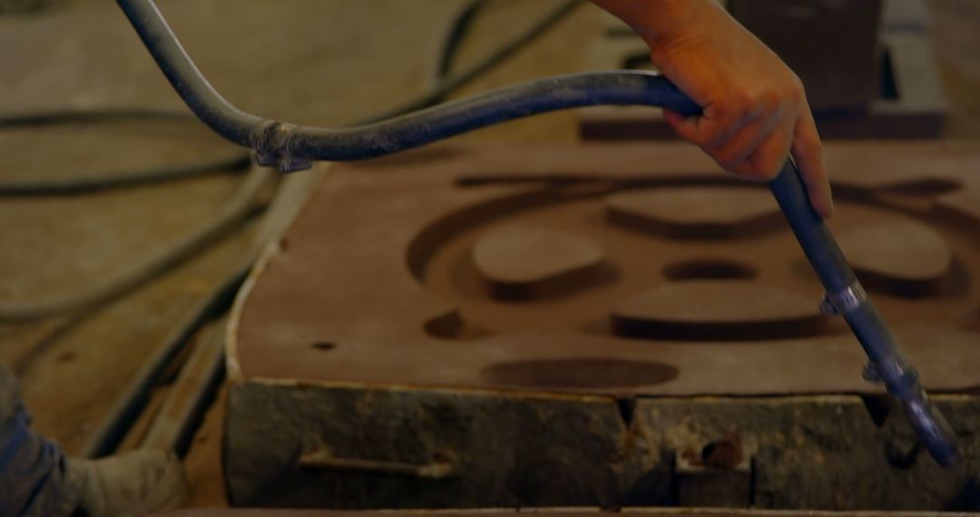 Worker Using Sand Blasting At Metal Casting Factory - Free Images, Stock Photos and Pictures on Pikwizard.com