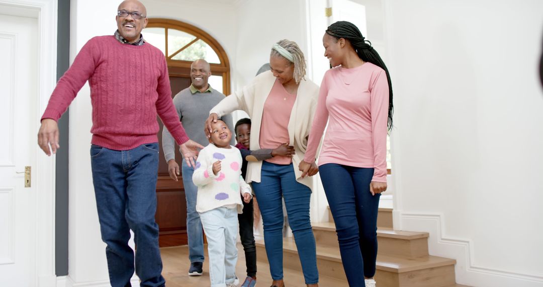 Happy African American Family Entering Home Together - Free Images, Stock Photos and Pictures on Pikwizard.com