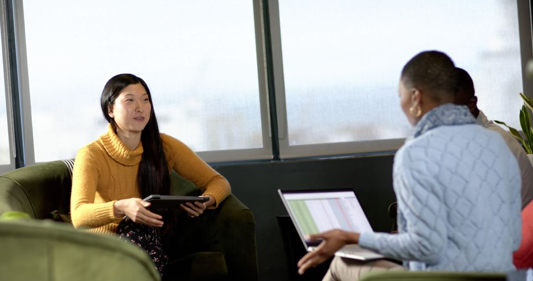 Casual Team Meeting Collaboration in Modern Office