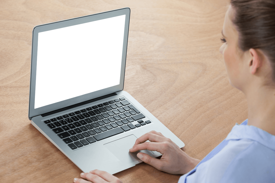 Businesswoman Focused on Work with Transparent Blank Laptop Screen