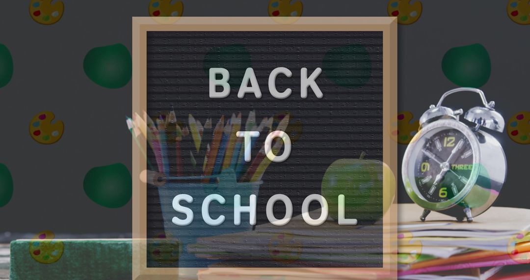 Back to School Concept with Alarm Clock and Supplies on Desk