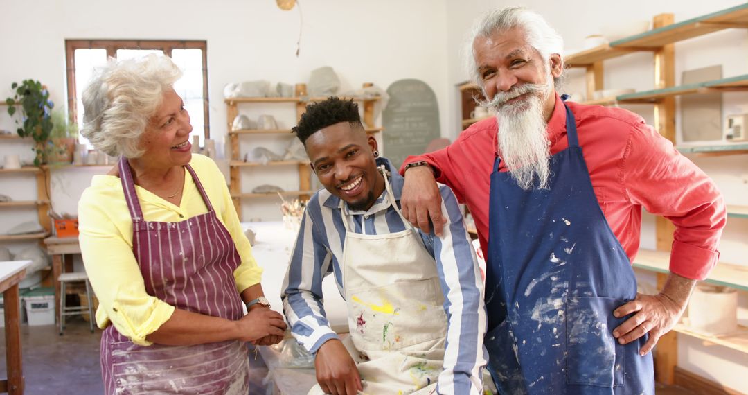 Multi-ethnic Group of Artists Smiling in Art Studio - Free Images, Stock Photos and Pictures on Pikwizard.com