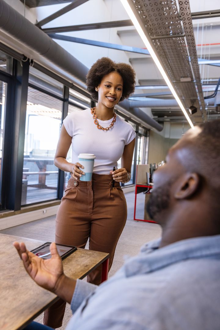 Dynamic Discussion in Modern Coworking Space with Coffee