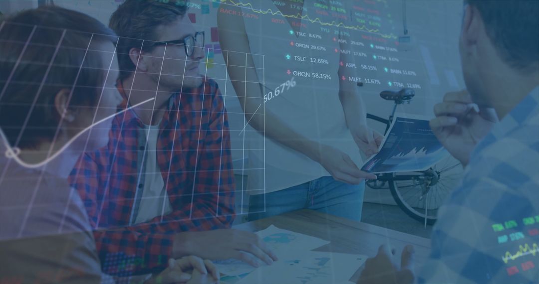 Team Analyzing Data with Financial Graph Overlays in Modern Office