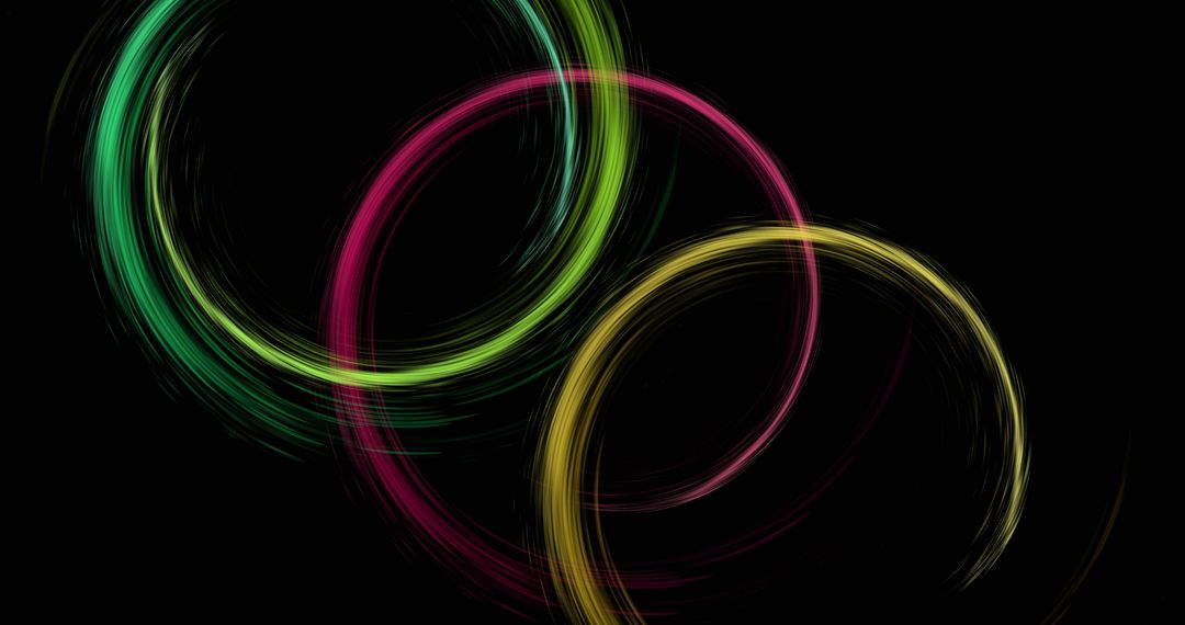 Colorful Light Trails in Circular Motion on Black Background