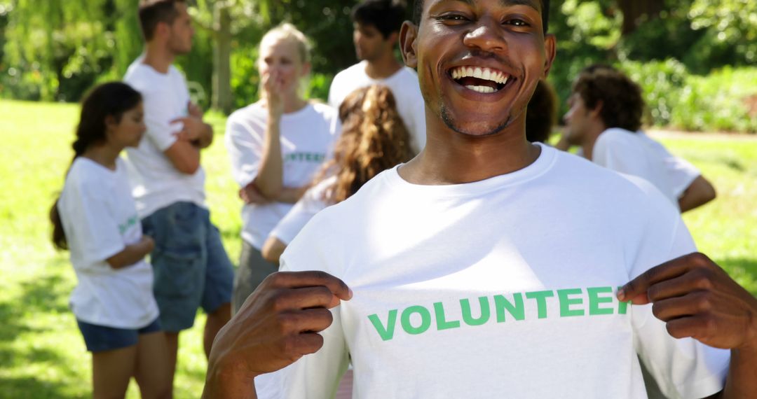 Smiling Volunteer in Team Bonding Outdoors - Free Images, Stock Photos and Pictures on Pikwizard.com