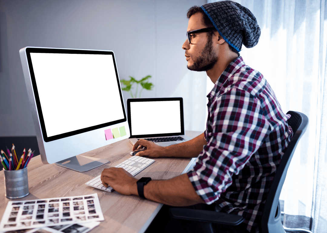 Transparent Background Designer at Computer in Modern Office