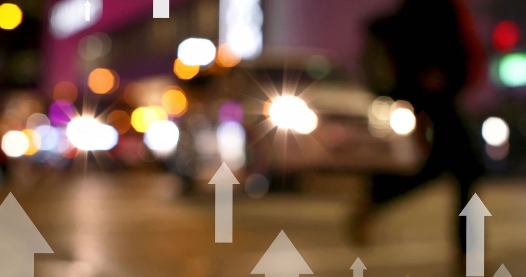 Busy Urban Street at Night with Upward Arrows Symbolizing Growth