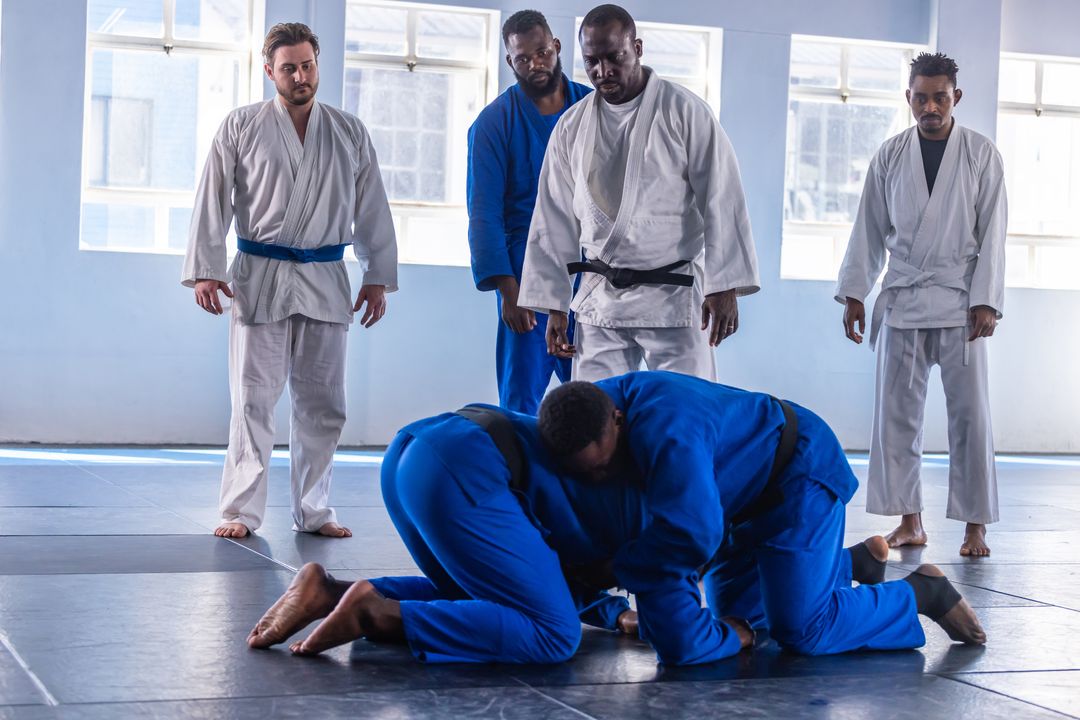 Martial Arts Athletes Practicing Grappling Technique