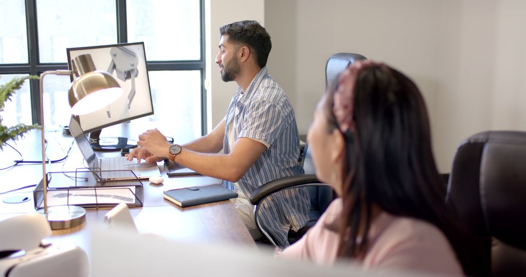 Professional Teamwork: Coworkers Collaborating at Modern Office